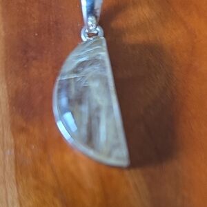 Elegant Rutilited Quartz Set In Sterling Silver.